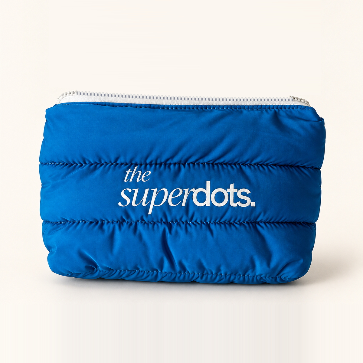 The Superdots quilted blue travel bag